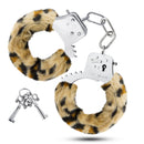 Temptasia Furry Leopard Adjustable Wrist Cuffs with leopard-print faux fur and keys for playful bondage.