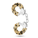 Temptasia Furry Leopard Adjustable Wrist Cuffs featuring leopard-print faux fur and metal chain for bondage play.