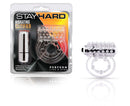 Stay Hard Clitifier Flicker Clear 7 Speed Vibrating Cock Ring package with vibrating bullet beside it.