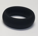 Spartacus Wide Silicone Donut Cock Ring 1.5 Inch Black displayed on a white background, highlighting its smooth black finish.