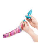 b-Vibe Unicorn Tail Vibrating Butt Plug Special Edition with multicolor tail and vibrating plug in hand.