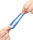 b-Vibe Snug Ring Tri-Sling Silicone Cock-and-Ball Sling being stretched by hands to demonstrate flexibility.