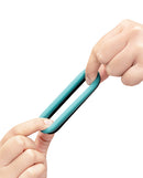 Hands stretching the b-Vibe Flex Band 30 mm Super Soft Silicone Cock Ring, showcasing its flexibility and comfort.
