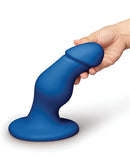 b-Vibe Gape 8.25 Inch Bulbous XXL Dildo with Suction Cup in blue, held by a hand.