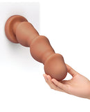 b-Vibe Headz 10.5 Inch Multi-Bulb XXL Dildo with Flared Base being held, showcasing its playful bulbous design.