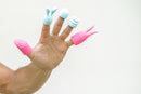Maia Toys Quinn 5 Piece Silicone Attachments Pink Blue displayed on fingers for enhanced stimulation.