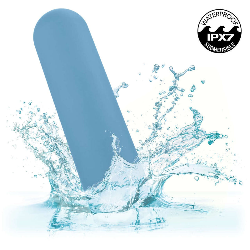 Turbo Buzz™ Rounded Bullet Vibrator in blue splashing in water, showcasing waterproof IPX7 rating.