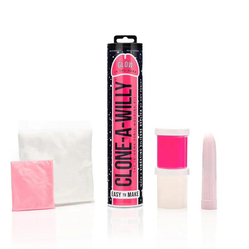 Clone-A-Willy Hot Pink Glow In The Dark Vibrating Silicone Dildo Kit components, including silicone tube, mold, and vibrator.
