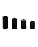 CB-X Cock Cage Spacers 4 Pack Black replacement spacers in four sizes for chastity device adjustment.