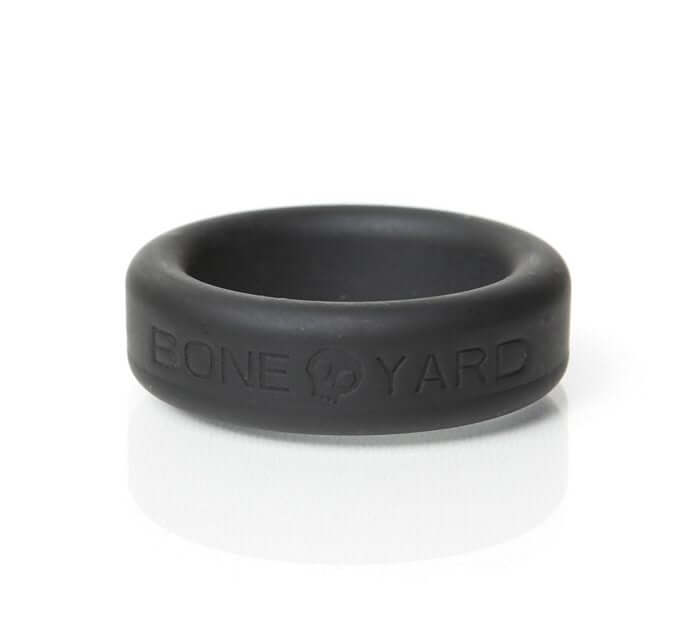 Boneyard Silicone Ring Cock Ring 1.2 inches Black displayed on a reflective surface.
