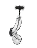 Boneyard Silicone Urethral Trainer Kit with Bullet Black displayed on a wall with a black suction base and silicone rods.