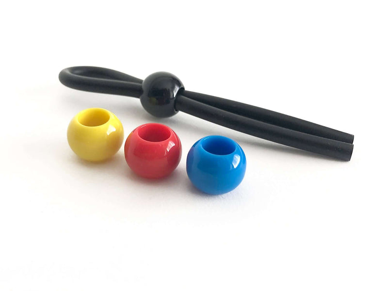 Boneyard Single Slide Cock Leash 2X Stretch Silicone Cock Tie with colorful beads in yellow, red, and blue.