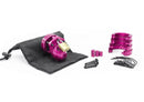 CB X MINI Cock Chastity Cage Kit Pink Glitter with accessories and storage pouch on a white background.
