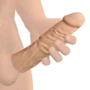 Jock Extra Long 1.5 Inch Penis Extension Light shown in hand to demonstrate lifelike texture and realistic appearance.