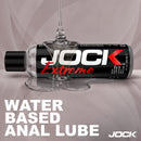 JOCK Extreme Water Based Anal Lubricant 8 Oz bottle with thick lube spilling, designed for comfortable anal play.