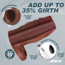 Jock Squirting Silicone Penis Enhancer Ball Strap Dark showing smooth interior and textured exterior for added girth.