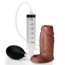 Jock Squirting Silicone Penis Enhancer Ball Strap Dark with pump for added girth and lifelike texture.