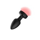 Viben Twila Twirling Smoke Gem Light Up Vibrating Anal Plug with a diamond-textured body and glowing red gem.