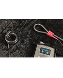 ElectraStim Recoil Zero Memory Uni-Polar Electrode Black and control unit on a soft black surface.