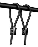 ElectraStim Prestige ElectraLoops Electro Cock Rings Black displayed on a bar for electrostimulation play.