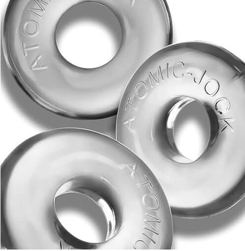 Close-up of three clear Atomic-Jock Ringer Max C-Rings by Oxballs, showcasing their durable and stretchy design.