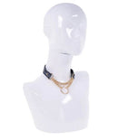 Stylish animal print faux leather day collar with gold hardware and ring displayed on a mannequin bust.
