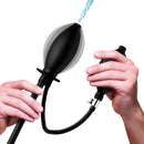 CleanStream Inflatable Enema Plug Black being held with water flowing, showcasing its unique design and functionality.
