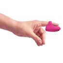 Hand holding the Dorcel Magic Finger Rechargeable Vibrator Pink for intimate pleasure.