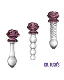 Dr Tush's Sacred Glass Rose Anal Plug Set featuring three beautiful borosilicate glass pieces with rose accents.
