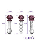 Dr Tush's Sacred Glass Rose Anal Plug Set featuring three unique borosilicate glass pieces with rose accents.
