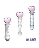 Dr Tush's Hearts of Pleasure Collection Anal Plug Set Glass featuring three elegant glass plugs with pink heart tops.