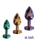 Dr Tush's Dragon Pearls Collection Anal Plug Set Metal in teal, gold, and purple colors showcasing geometric designs.