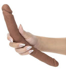 Silicone Studs Bend and Hold Dual Dildo 12 inch Brown held in hand with natural nails.