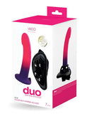 Duo Silicone Dildo with Harness in Pink/Purple packaging, featuring a 7-inch semi-realistic design with a strong suction cup.