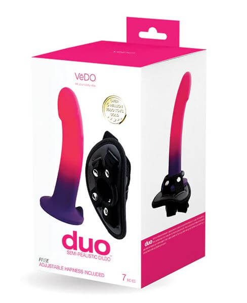 Duo Silicone Dildo with Harness in Pink/Purple packaging, featuring a 7-inch semi-realistic design with a strong suction cup.