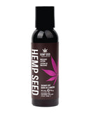 Earthly Body Hemp Seed Massage Lotion 2 oz Skinny Dip in a black bottle with a pink leaf design.