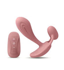Pink G-spot vibrator with remote control for clitoral stimulation, featuring flexible silicone design for comfort.