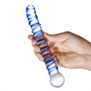Mr Swirly 6.5 inches Glass G-Spot Dildo in a hand showcasing its spiral design and curved tip.