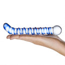 Mr Swirly 6.5 inches Glass G-Spot Dildo held in hand showcasing its spiral design and elegant shape.