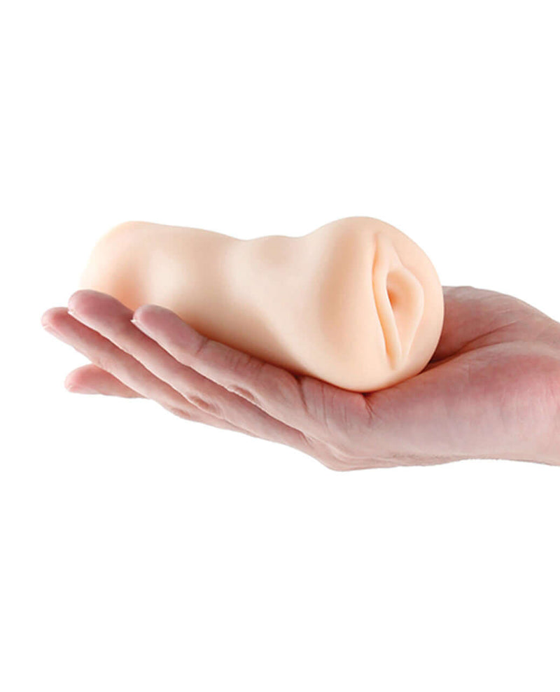 Hand holding Barely Legal Christine Stroker - White realistic adult toy