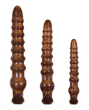 Evolved Twisted Love 3 Piece Butt Plug Set Gold with graduated plugs in three sizes for backdoor play.