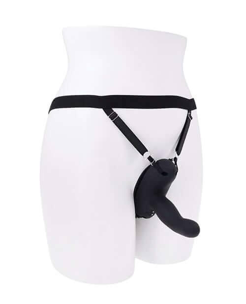 Come Closer Strap-On Vibrator with Remote Black on a harnessed figure displaying its design and functionality.