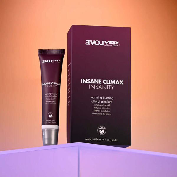 Evolved Insane Climax Insanity warming buzzing clitoral stimulant 0.34 oz packaging with product on display.