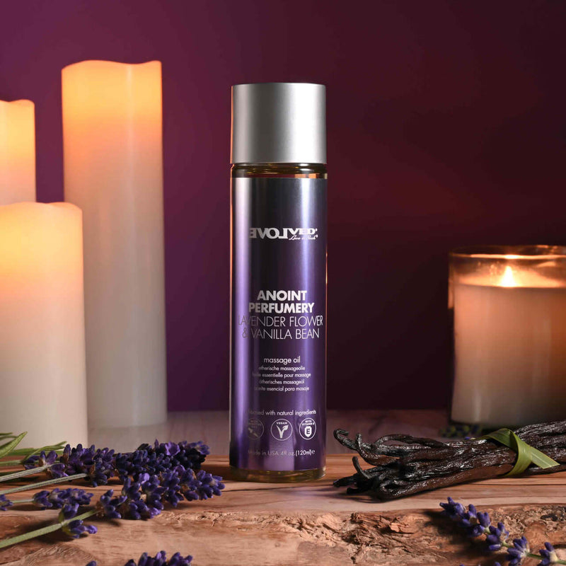 Anoint Perfumery Lavender Flower & Vanilla Bean massage oil in an elegant setting with candles and lavender.