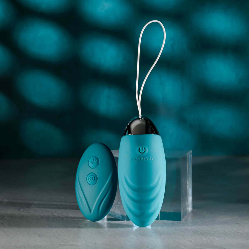 Evolved Oval Office remote control vibrating egg with teal color on display