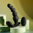 Rechargeable black silicone vibrating anal beads with remote control on pastel geometric surfaces.