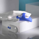 Take Your Pick Rechargeable Bullet Set with Remote on a table with a hand holding the device and remote control.
