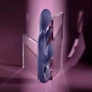 Bow Down Vibrator with Clitoral Stimulator Purple displayed against a stylish background.