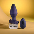 Starburst Expandable Anal Plug with Remote Purple displayed on a yellow background, showcasing its unique design and remote.