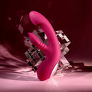 Gentle Persuasion Vibrator with Clitoral Stimulator Red displayed with geometric crystals in the background.